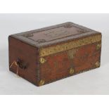A 19th century dark wood and brass studded Zanzibar chest, the hinged rectangular top opening to a