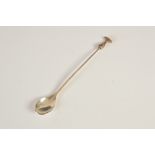 A silver cocktail stirring spoon by Graham Stewart, Edinburgh, the tapered elongated stem with bud