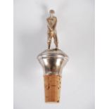 Golf interest - A silver bottle stopper modelled with a golfer, Birmingham, 1997, makers mark LRW,