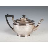 A George V silver teapot, Sheffield, 1913, makers mark of J.D&S, oval shaped with Neoclassical