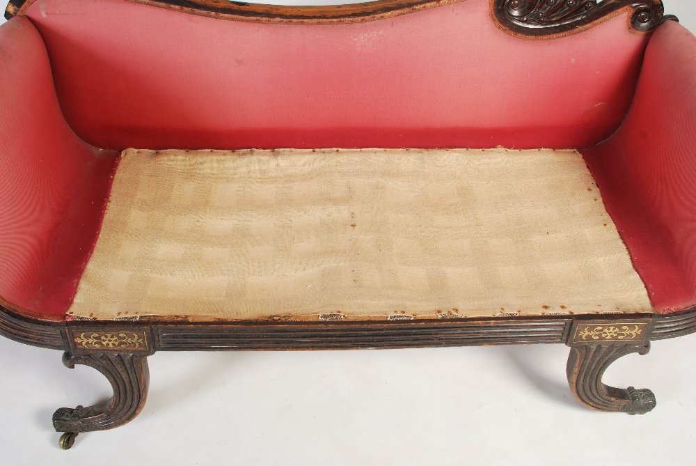 A Regency mahogany and brass inlaid sofa, the scroll carved top rail above an upholstered back and - Image 11 of 13