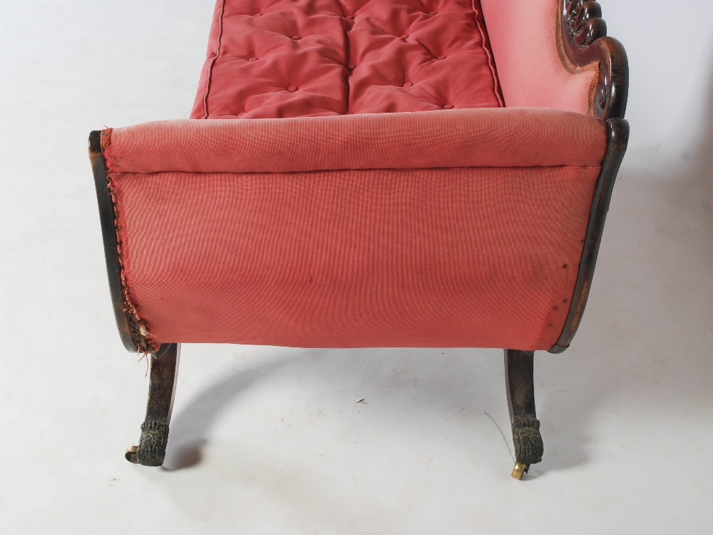 A Regency mahogany and brass inlaid sofa, the scroll carved top rail above an upholstered back and - Image 8 of 13