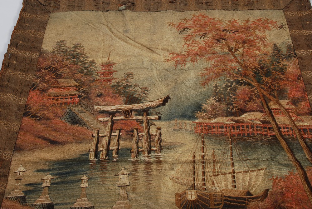 A Japanese silkwork hanging, Meiji Period, worked in coloured threads with river scene, bridge, - Image 2 of 8