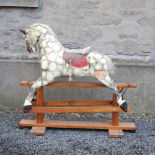 A Victorian style mid 20th century painted pine rocking horse, with horse hair mane, tail and