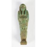 Antiquities- An Ancient Egyptian green glazed faience shabti, circa Late Period, with incised