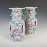 A pair of Chinese porcelain famille rose vases, Qing Dynasty, decorated with rectangular shaped