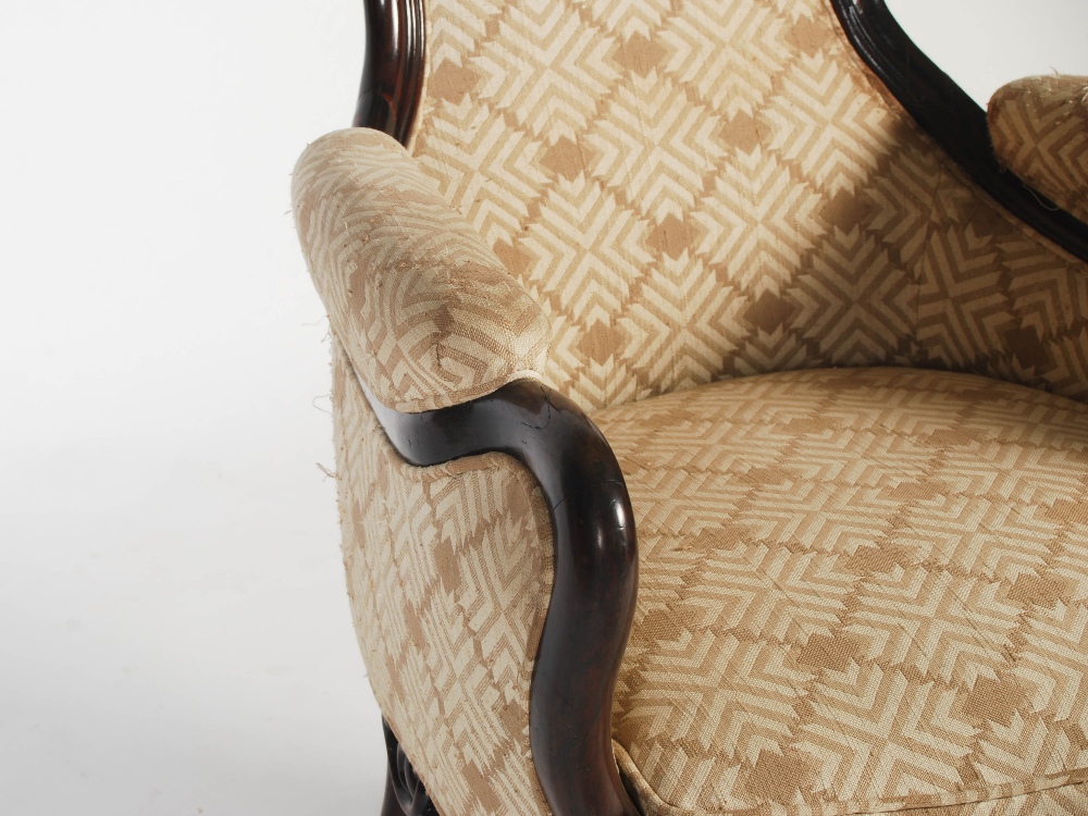 A pair of Chinese dark wood upholstered armchairs, Qing Dynasty, the shaped back, arms and stuffover - Image 4 of 8