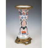 A 19th century ormolu mounted Imari porcelain vase, the porcelain vase decorated with flowers and