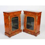 A pair of 19th century walnut, marquetry and gilt metal mounted pier cabinets, the rectangular