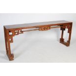 A Chinese blonde wood rectangular table, late 19th/early 20th century, the rectangular panelled