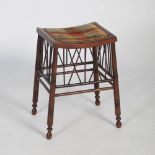 A late 19th/early 20th century stained beech dressing table stool, the concave rectangular top