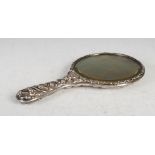 An Edwardian silver dressing table mirror, London, 1907, makers mark of W.A, with embossed