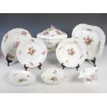 An extensive 18th century Vienna porcelain part dinner service, of moulded form decorated with