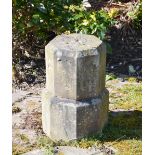 An early 20th century stone octagonal garden column, in two sections, 33cm diameter x 59cm high.