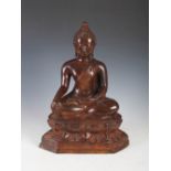 A Thai bronze figure of Buddha, seated cross legged on lotus throne, 39cm high x 29cm wide.