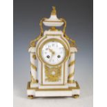 A late 19th century French gilt metal and marble mantle clock in the Neoclassical taste, the