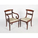 A set of eight early 19th century Scottish mahogany dining chairs, the concave top rails with