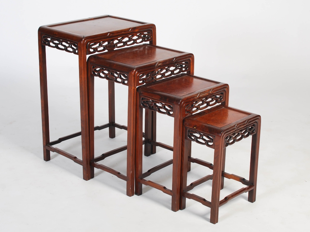 A quartetto of Chinese dark wood and burr wood occasional tables, late 19th/early 20th century,