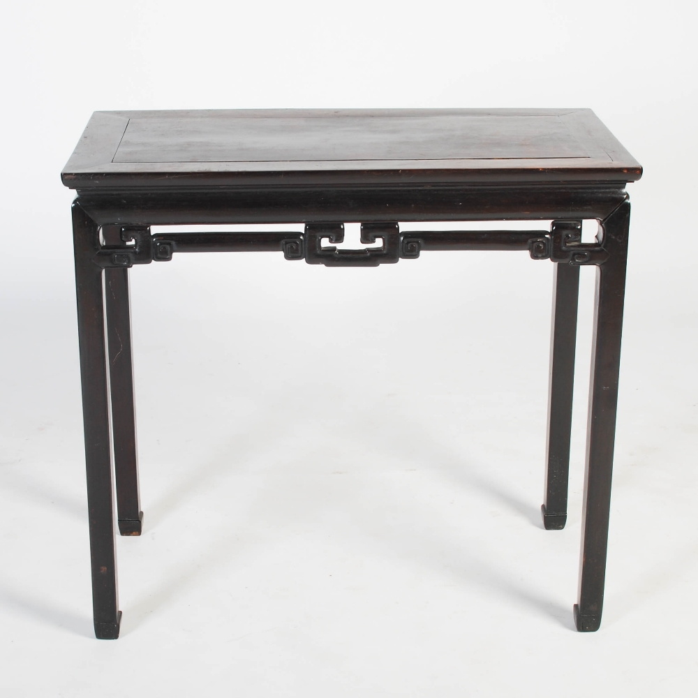 A Chinese dark wood rectangular table, Qing Dynasty, the rectangular panelled top above a plain - Image 6 of 8