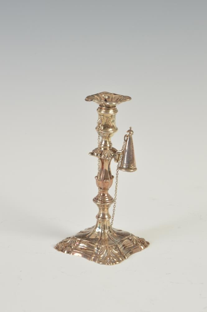 A William IV silver candlestick, Sheffield 1835, makers mark of K & W, with detachable drip pan