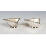 A pair of George VI silver facsimile Traprain Treasure triangular shaped salts, Edinburgh, 1940,