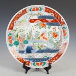 A late 19th/early 20th century Japanese Imari porcelain dish, decorated with ducks and carp,