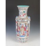 A Chinese porcelain famille rose Canton vase, Qing Dynasty, decorated with rectangular shaped panels