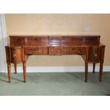 A 19th century Scotitsh mahogany and ebony lined sideboard, the rectangular top with upright stage