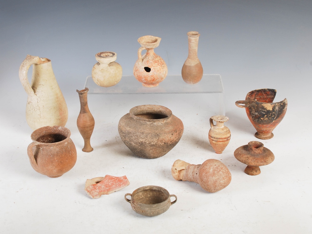 Antiquities- A collection of Ancient Roman pottery, comprising; small aryballos with oviform body - Image 2 of 14