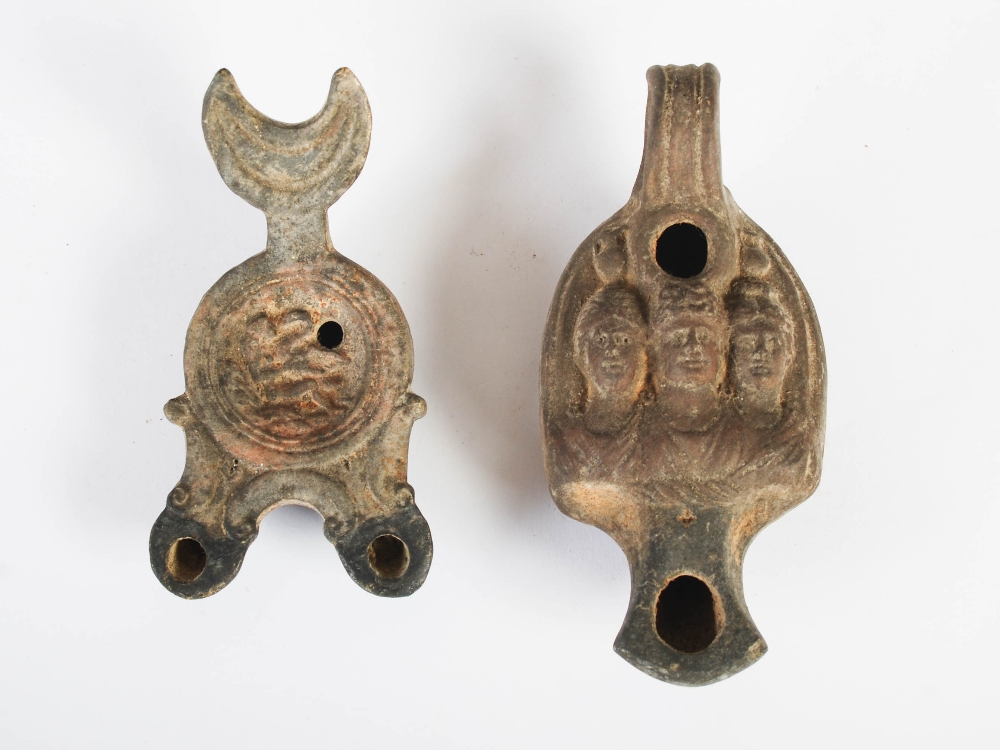 Antiquities- A collection of eight Ancient Roman terracotta oil lamps, comprising; one plain oil - Image 13 of 20