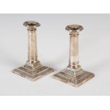 A pair of George V silver candlesticks, Sheffield, 1916, makers mark of TB&S for Thomas Bradbury &