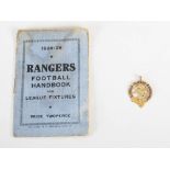 A Scottish Football Association 14ct gold and enamel medal inscribed to R.Simpson 1952, together
