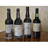 Four bottles of assorted vintage port to include Taylor 1970, Grahams 1970, Berrys' 1992, late