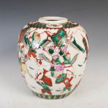A Chinese porcelain famille rose crackle glazed jar, Qing Dynasty, decorated with warrior figures