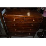 A 19TH CENTURY MAHOGANY TWO OVER THREE CHEST OF DRAWERS ON BRACKET FEET, STAINED OAK DECO STYLE