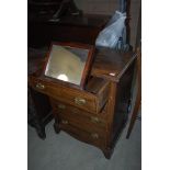 A 19TH CENTURY MAHOGANY INLAID DRESSING CHEST WITH FOUR FRIEZE DRAWERS, ON BRACKET FEET, TOGETHER