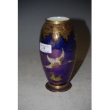 CARLTON WARE BLUE GROUND CHINOISERIE DECORATED BULLET SHAPED VASE, DECORATED WITH RED CAPPED