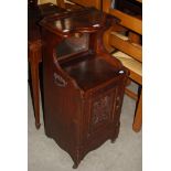 LATE VICTORIAN MAHOGANY BEDSIDE LOCKER WITH FOLIATE CARVED PANEL DOOR