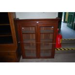 A 19TH CENTURY MAHOGANY TWO DOOR GLAZED BOOKCASE TOP