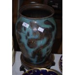 WMF OVOID SHAPED BRONZED VASE DECORATED WITH DRAGON FIGURES, ON CHINESE HARDWOOD STAND