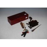 VINTAGE RED LEATHER TIE BOX CONTAINING A YELLOW METAL MOUNTED CHEROOT HOLDER STAMPED 9CT, IN