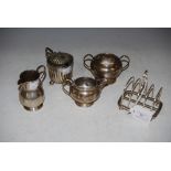 LONDON SILVER FIVE BAR TOAST RACK, CHESTER SILVER CREAM JUG WITH ARMORIAL DETAIL, BIRMINGHAM