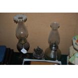 THREE GLASS OIL LAMPS - TWO WITH FUNNELS