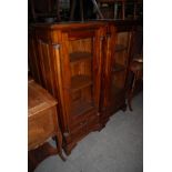 PAIR OF STAINED PINE GLAZED SIDE CABINETS, WITH GLAZED PANELLED DOOR AND TWO FRIEZE DRAWERS, ON