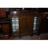 MAHOGANY THREE DOOR DISPLAY CABINET WITH TWO OUTER GLAZED ASTRAGAL DOORS AND CENTRAL PANEL DOOR