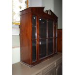 A 19TH CENTURY MAHOGANY GLAZED CABINET