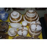 WHITE AND GILT PART DINNER SERVICE AND MATCHING TEA SERVICE