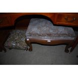 TWO 20TH CENTURY MAHOGANY FRAMED UPHOLSTERED FOOT STOOLS