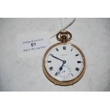 A 9CT GOLD CASED OPEN FACED POCKET WATCH, THE WHITE ROMAN NUMERAL DIAL SIGNED GARRARD, WITH