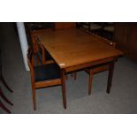 MID 20TH CENTURY TEAK DINING SUITE COMPRISING EXTENDING DINING TABLE, FOUR SIDE CHAIRS WITH